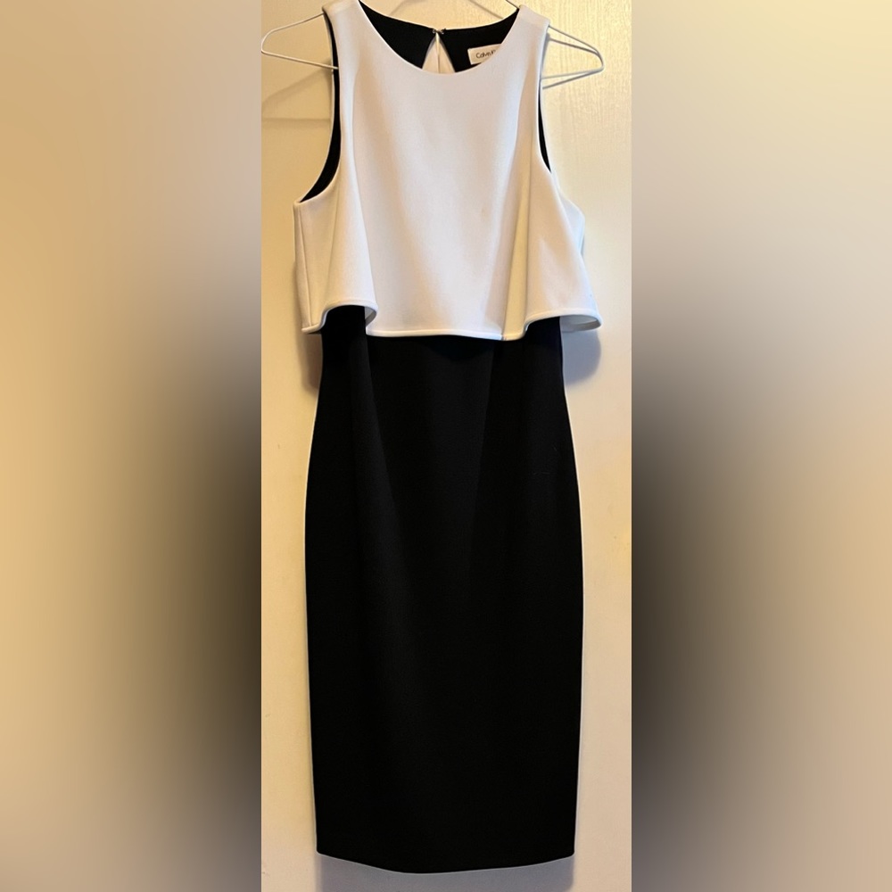 Calvin Klein black dress with attached white top and peek-a-boo back